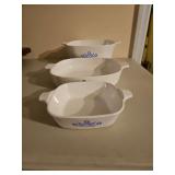 Three pieces of blue corningware