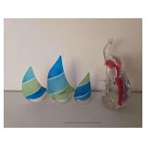 Glass elephant and sailboat style candle holders