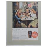 Framed Coca-Cola advertisement