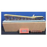 Lionel No. 362 Operating Barrel Loader with box. Includes box of 362-78 barrels.