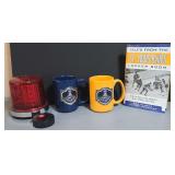 Hockey Fan package. St. Louis Blues Championship mugs, locker room book and the Goal Light.