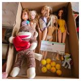 Flat of Barbie Dolls and Other Toys
