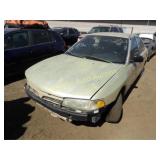 2000 Mitsubishi Mirage JA3AY26C8YU019764 Gold