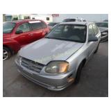 2004 Hyundai Accent KMHCG45C04U510071 Silver