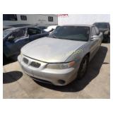1999 Pontiac Grand Prix 1G2WP52K3XF339932 Silver