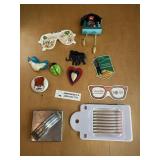 Assorted magnets and kitchen items
