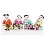 Set of Four Ceramic Figurines in Traditional Attir