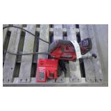 Milwaukee cordless grease gun, with charger