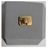 MARKED '1/10TH 10K GF' PIN W/EMERALD LIKE GEMSTONE
