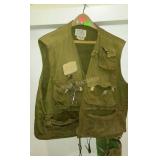 Orvis fishing vest size large , sunglasses,  fly
