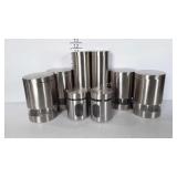 Stainless canisters, plastic and glass bases,