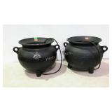 Two electric kettles, one has been used as a
