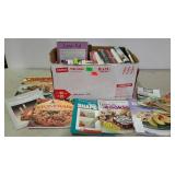 Box of cookbooks including the Pampered Chef,