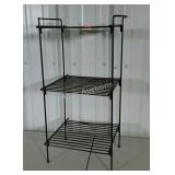 Three tiered iron plant stand. One broken weld