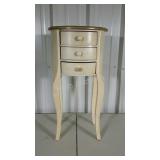 Three drawer side stand. Shows some wear.