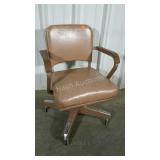 Rolling desk chair. Older, heavy duty chair.