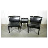 Three piece grouping. Two pleather chairs and