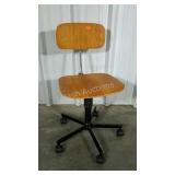 Rolling desk chair. Wood seat and back. Seller