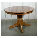Pedestal table. 42" round by 30" high. Seller