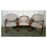 Three waiting room chairs. Two styles but all