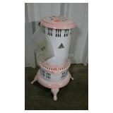 Perfection kerosene heater. Painted white and