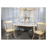 Kitchen table with four chairs couple tiles on