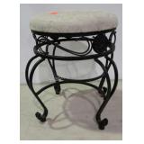 Upholstered and metal footstool