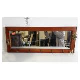 Hall mirror with coat hooks and brass letter