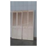 Two sets of 30 inch bifold closet doors, one is