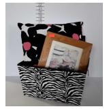 Home decor storage bin, framed cat picture, and