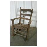 Slat seat ladderback rocking chair. Weathered