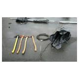 Four axes, air hose, and bag of misc garage items