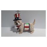 Patriotic dog statue with welcome sign