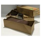 Four boxes of sanding belts