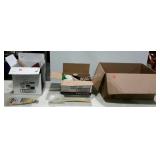 Group of three boxes, includes broom and brush