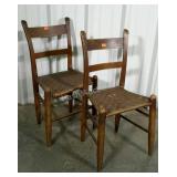 Two mule eared cane seat chairs. One is missing