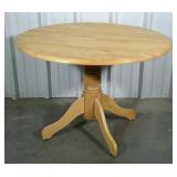 Round pedestal table. 42" round and 29" high.