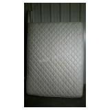 Sealy Posturepedic mattress and boxspring set.