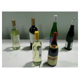 Six wine bottles