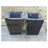 Two wicker planters boxes and metal lawn decor