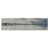 Group of three fishing poles, one does have reel