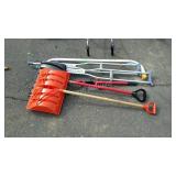 Two snow shovels and crutches and truck club lock