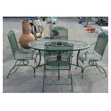 Green wrought iron patio table and four chairs 54