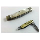 Two pocket knives one is mother of pearl