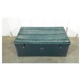 Metal storage trunk with carry handles. Somewhat