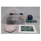 Clear plastic tote with home decor items,