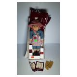 American Girl doll "Kirsten" with extra outfits,