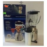 Oster 8 speed blender and travel cup with box
