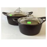 Two All-Clad pots with lids