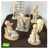Six figurines, one dept 56 and the Christopher